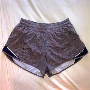 HEATHERED BLACK HOTTY HOT LULULEMON SHORT SIZE 8 / 4” LENGTH (LOW-RISE)